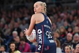 Jo Weston helped the high-flying Vixens to a two-point win over the NSW Swifts in Sydney. (James Ross/AAP PHOTOS)